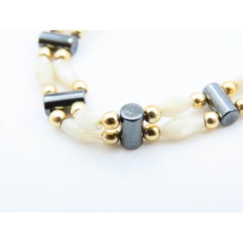 1151 - Mother of Pearl Twin Row 9 Carat Yellow Gold Mounted Ladies Bracelet of Articulated Form 17.5cm Long