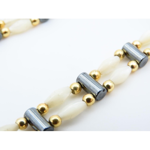 1151 - Mother of Pearl Twin Row 9 Carat Yellow Gold Mounted Ladies Bracelet of Articulated Form 17.5cm Long