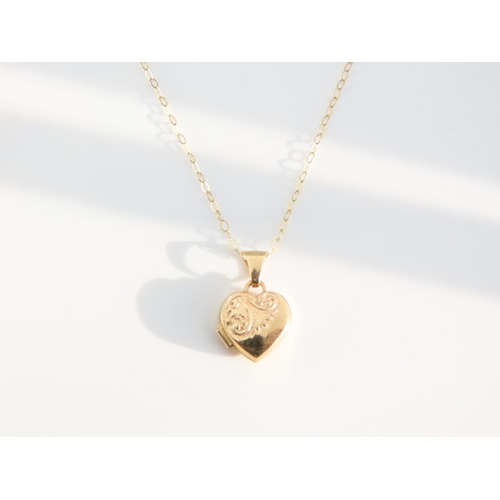 1182 - 9 Carat Yellow Gold Heart Motif Pendant Locket Hinged Cover Incised Detailing Set on 9 Carat Yellow ... 