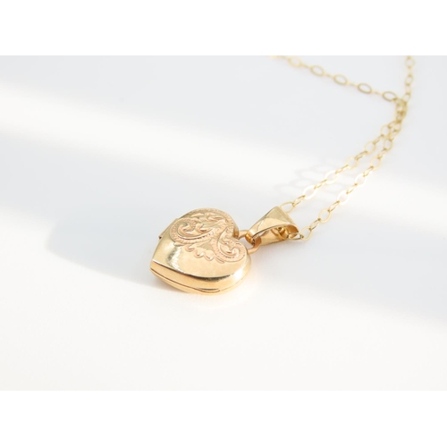 1182 - 9 Carat Yellow Gold Heart Motif Pendant Locket Hinged Cover Incised Detailing Set on 9 Carat Yellow ... 