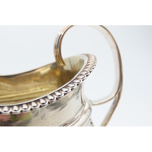 1188 - Silver Milk Jug Bun Form Supports Egg and Dart Rim Flying C Scroll Handle 11cm High