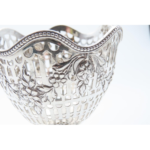 1189 - Silver Bon Bon Basket Swing Carry Handle Pedestal Form Open Filigree  Decoration Basket 10cm High