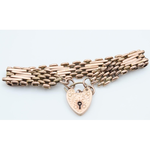 1196 - 9 Carat Rose Gold Ladies Bracelet Heart Motif Locket Clasp with Engraved Detailing