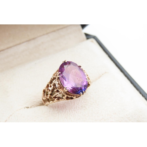 1201 - Violet Sapphire 9 Carat Yellow Gold Ring with Finely Detailed Band Ring Size T