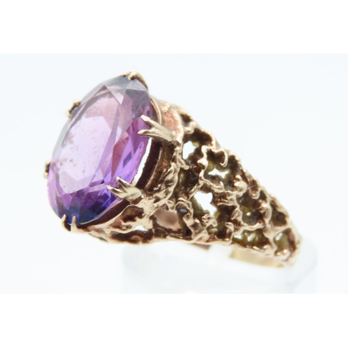 1201 - Violet Sapphire 9 Carat Yellow Gold Ring with Finely Detailed Band Ring Size T