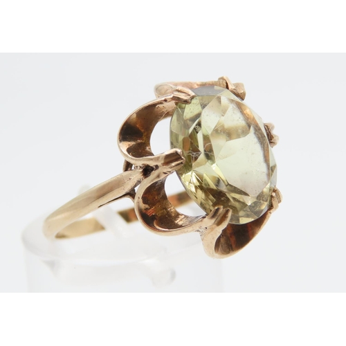 1213 - Champagne Garnet Centre Stone Ring Mounted on 9 Carat Yellow Gold Band Ring Size N and a Half