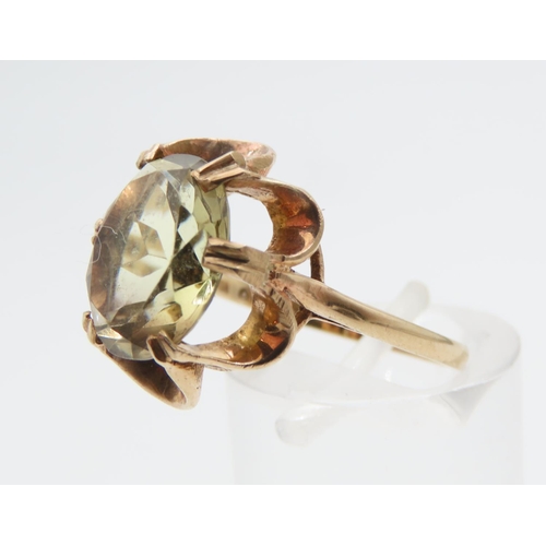 1213 - Champagne Garnet Centre Stone Ring Mounted on 9 Carat Yellow Gold Band Ring Size N and a Half