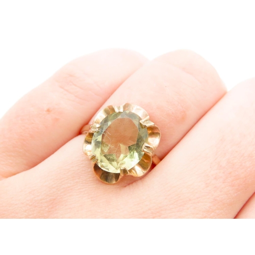 1213 - Champagne Garnet Centre Stone Ring Mounted on 9 Carat Yellow Gold Band Ring Size N and a Half