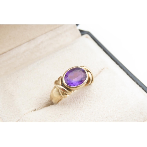 1214 - Amethyst Oval Cut Centre Stone Ring Mounted on 9 Carat Yellow Gold Band Ring Size Q