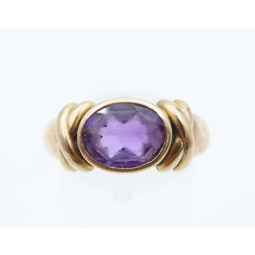 1214 - Amethyst Oval Cut Centre Stone Ring Mounted on 9 Carat Yellow Gold Band Ring Size Q