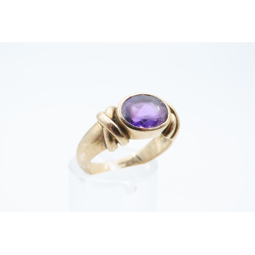 1214 - Amethyst Oval Cut Centre Stone Ring Mounted on 9 Carat Yellow Gold Band Ring Size Q