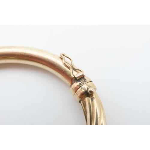 1217 - 9 Carat Yellow Gold Twist Form Ladies Bangle Inner Diameter 6.5cm