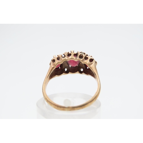 1219 - Garnet Three Stone Ring Mounted on 9 Carat Yellow Gold Band Ring Size M