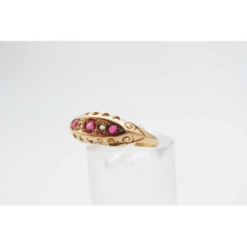 1226 - 18 Carat Yellow Gold Ruby Three Stone Ring Size L and a Half