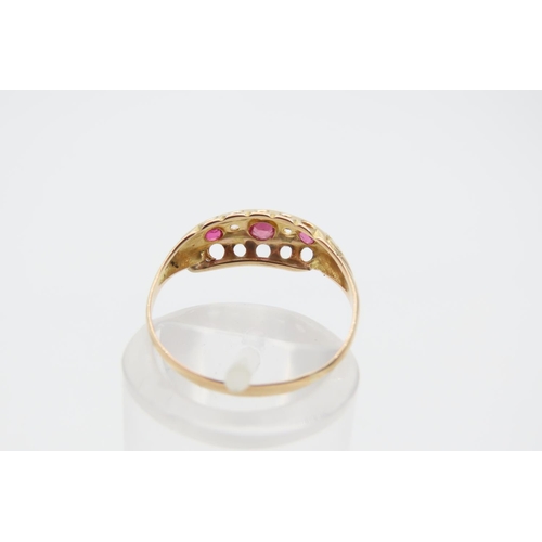 1226 - 18 Carat Yellow Gold Ruby Three Stone Ring Size L and a Half