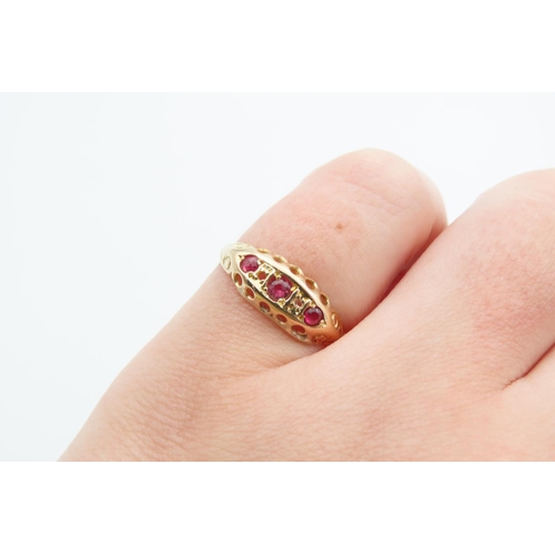 1226 - 18 Carat Yellow Gold Ruby Three Stone Ring Size L and a Half