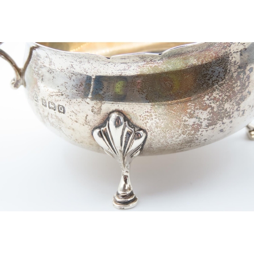 1243 - Silver Sauce Boat Flying Sea Scroll Handle Shaped Supports 13cm Wide x 8cm High