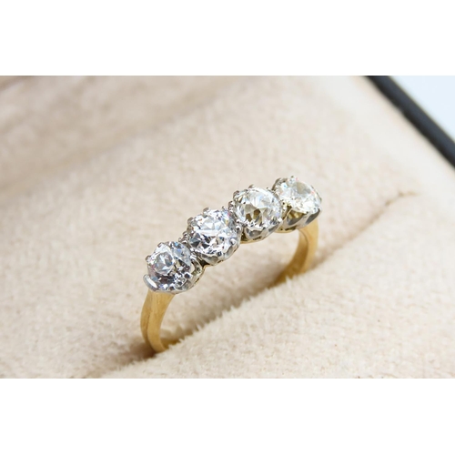 1249 - Edwardian Four Stone Diamond Ring Circa. 1910 Platinum Set Mounted on 18 Carat Yellow Gold Band Tota... 