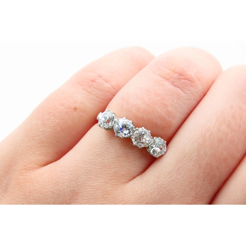 1249 - Edwardian Four Stone Diamond Ring Circa. 1910 Platinum Set Mounted on 18 Carat Yellow Gold Band Tota... 