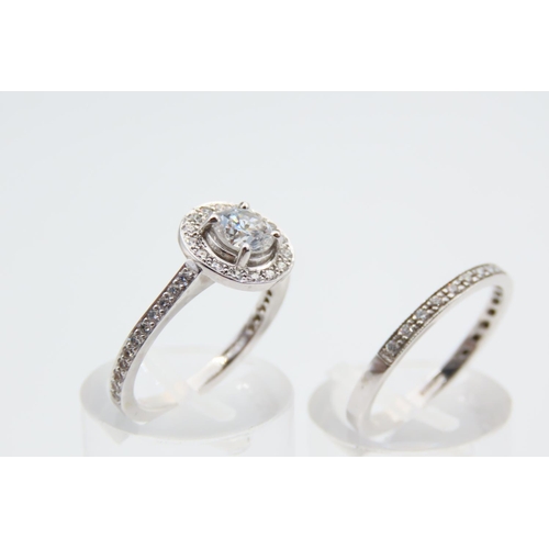 1250 - Pair of Platinum Rings Diamond Set Rings Main Ring .80 Carat Center Diamond Surrounded by Single Row... 
