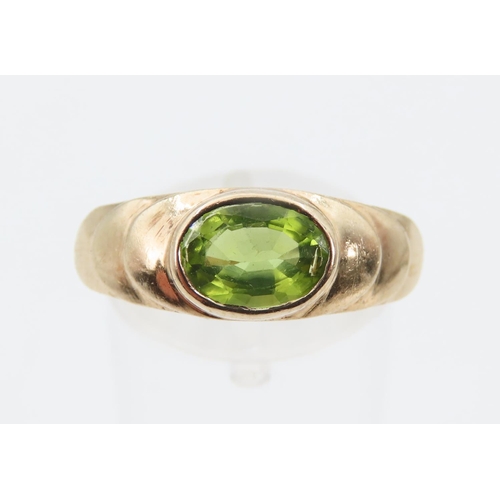 1275 - Peridot Centre Stone Ring Mounted on 9 Carat Yellow Gold Band Rub Over Setting Size O and a Half