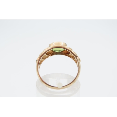 1275 - Peridot Centre Stone Ring Mounted on 9 Carat Yellow Gold Band Rub Over Setting Size O and a Half