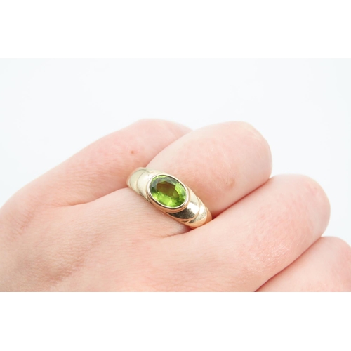 1275 - Peridot Centre Stone Ring Mounted on 9 Carat Yellow Gold Band Rub Over Setting Size O and a Half