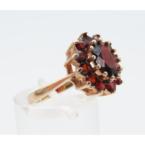 1276 - Red Garnet Cluster Ring Mounted on 9 Carat Yellow Gold Ring Size K