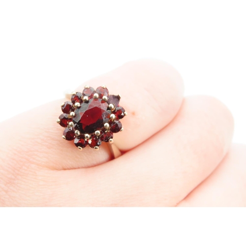 1276 - Red Garnet Cluster Ring Mounted on 9 Carat Yellow Gold Ring Size K