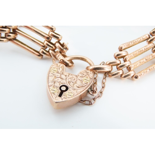 1279 - 9 Carat Rose Gold Four Bar Bracelet Articulated Form Heart Motif Padlock Clasp 18.5cm Long