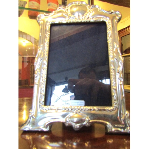 129 - Pair of Silver Table Photograph Frames Each 7 Inches High x 5 Inches Wide