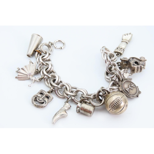 1312 - Silver Charm Bracelet Laden with Various Charms 20cm Long