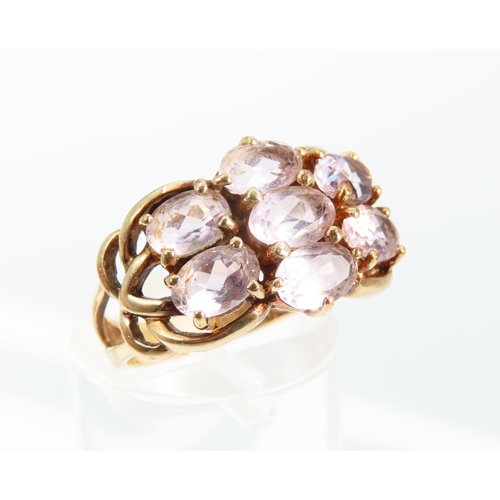 1321 - Pale Amethyst Eight Stone Ladies Cluster Ring Mounted on 9 Carat Yellow Gold Band Ring Size O