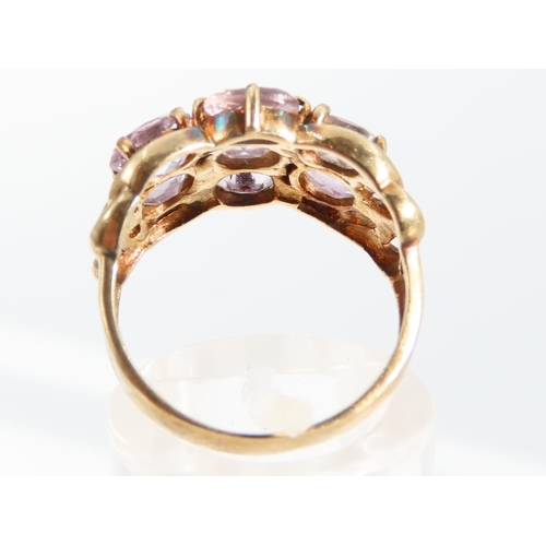 1321 - Pale Amethyst Eight Stone Ladies Cluster Ring Mounted on 9 Carat Yellow Gold Band Ring Size O