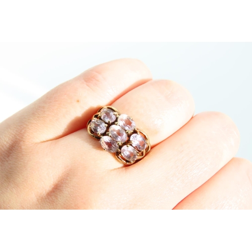 1321 - Pale Amethyst Eight Stone Ladies Cluster Ring Mounted on 9 Carat Yellow Gold Band Ring Size O