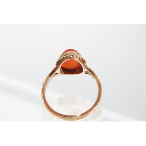 1325 - Cabochon Oval Cut Red Gemstone Ring Mounted on 9 Carat Yellow Gold Band Basset Set Ring Size O