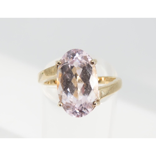 1333 - Kunzite Oval Cut Four Claw Set Ladies Centre Stone Ring Mounted on 9 Carat Yellow Gold Band