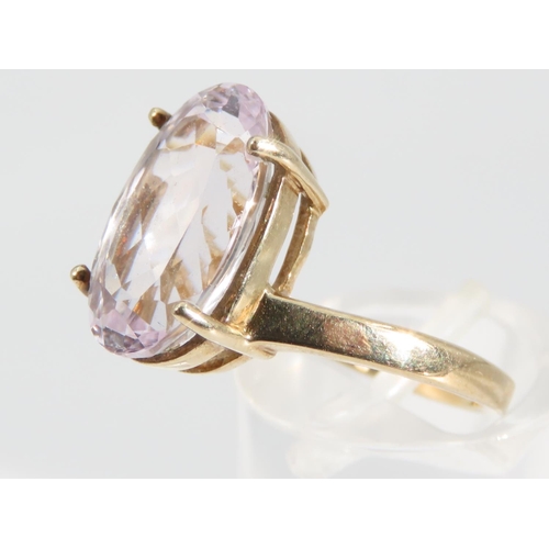 1333 - Kunzite Oval Cut Four Claw Set Ladies Centre Stone Ring Mounted on 9 Carat Yellow Gold Band