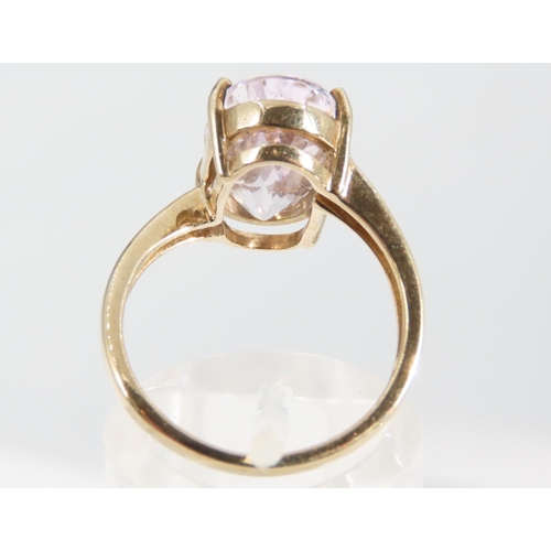 1333 - Kunzite Oval Cut Four Claw Set Ladies Centre Stone Ring Mounted on 9 Carat Yellow Gold Band