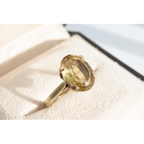 1337 - Smokey Quartz Statement Ring Oval Cut Four Claw Setting Mounted on 9 Carat Yellow Gold Band Ring