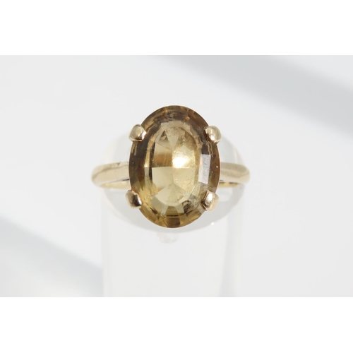 1337 - Smokey Quartz Statement Ring Oval Cut Four Claw Setting Mounted on 9 Carat Yellow Gold Band Ring