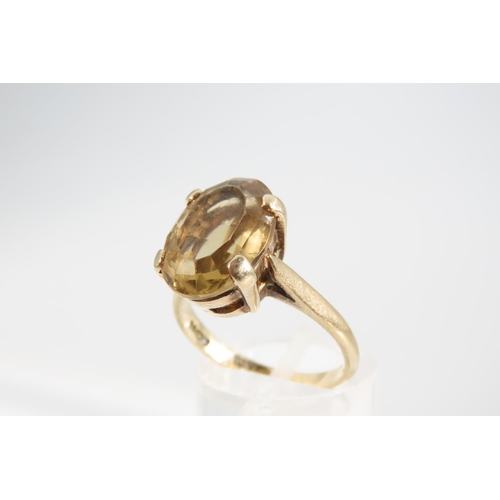 1337 - Smokey Quartz Statement Ring Oval Cut Four Claw Setting Mounted on 9 Carat Yellow Gold Band Ring