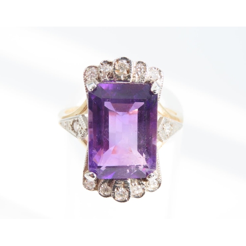 1339 - Amethyst and Diamond Ladies Ring Mounted on 9 Carat Yellow Gold Band Ring Size O