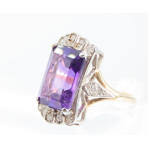 1339 - Amethyst and Diamond Ladies Ring Mounted on 9 Carat Yellow Gold Band Ring Size O