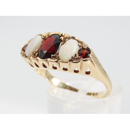 1340 - Garnet and Opal Five Stone Ring Mounted on 9 Carat Gold Band Size P