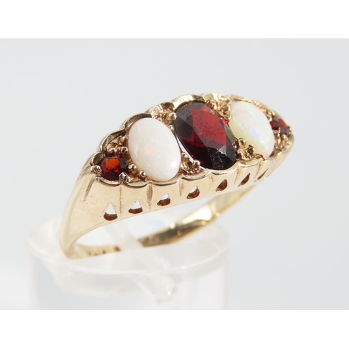 1340 - Garnet and Opal Five Stone Ring Mounted on 9 Carat Gold Band Size P