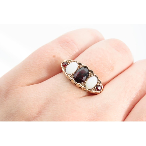 1340 - Garnet and Opal Five Stone Ring Mounted on 9 Carat Gold Band Size P