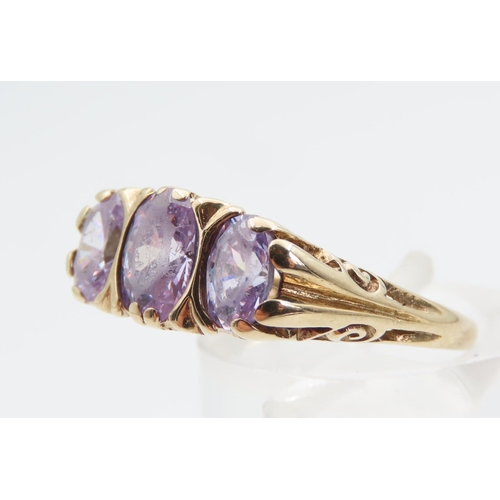 1342 - Three Stone Violet Sapphire and Diamond 9 Carat Yellow Gold Ring Size O