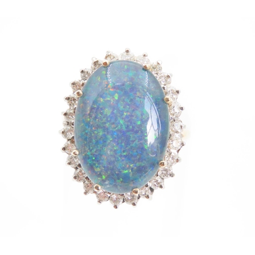 1357 - Opal and Diamond Ladies Cluster Ring Mounted on 9 Carat Yellow Gold Band Ring Size O