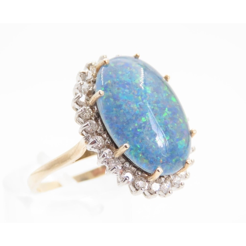 1357 - Opal and Diamond Ladies Cluster Ring Mounted on 9 Carat Yellow Gold Band Ring Size O